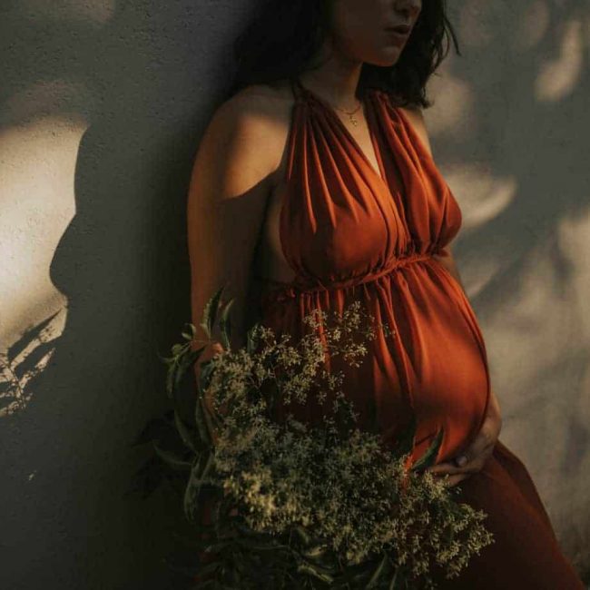 Canva – Woman Standing by the Wall Canva - Woman Standing by the Wall